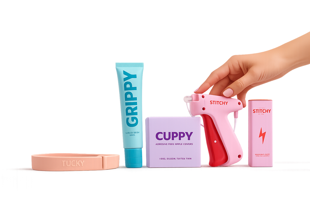 The Tucky waistband loop, Grippy liquid body tape, Cuppy nipple cover box and Stitchy fastening tool arranged together, with a hand reaching for the Stitchy tool.